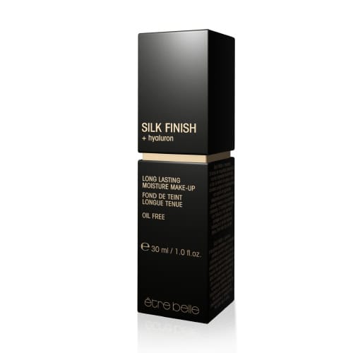 Elegant black box of Silk Finish foundation with hyaluronic acid. Long-lasting, oil-free makeup for radiant skin.